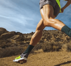 Person running through the rocky desert