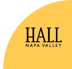 Hall Wines logo with yellow curved background